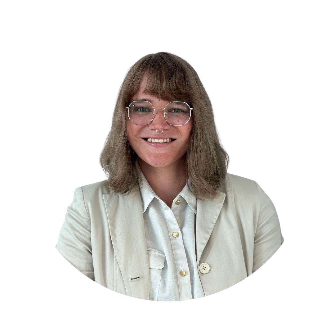 Ari wearing business casual clothing.